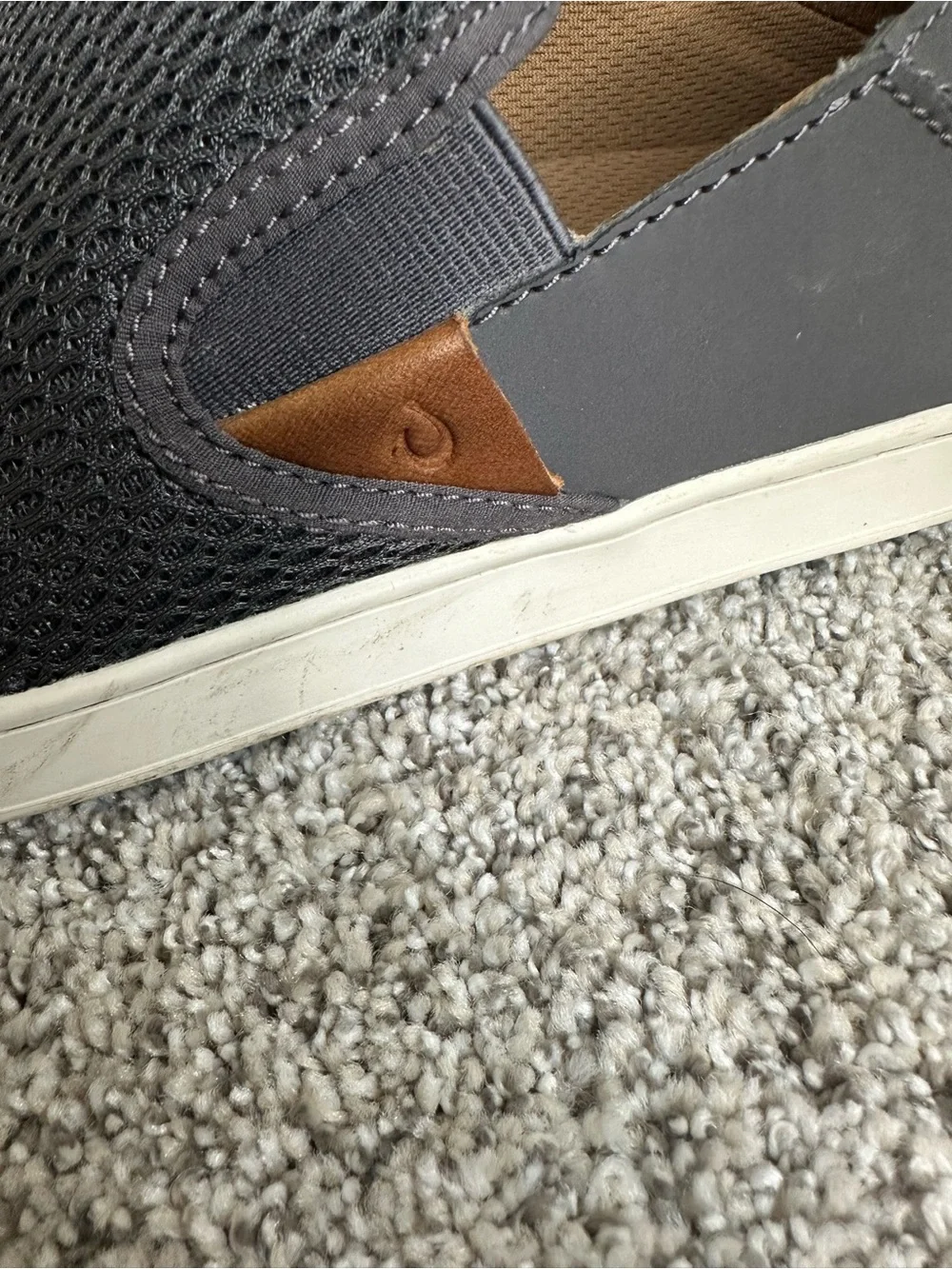 OluKai Women’s Slip-On Sneakers in Charcoal with White Sole